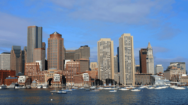 Boston harbour and cityscape on a sunny day.