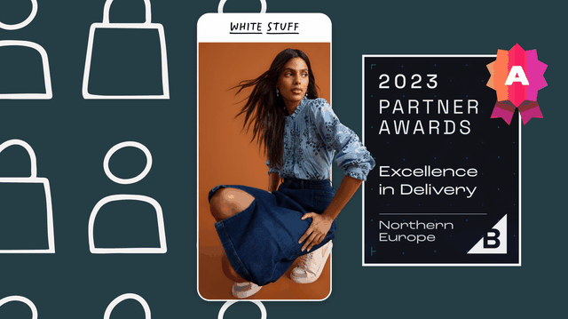 A woman wears a blue top, a denim skirt, and white sneakers. A mobile wireframe appears around her as if she emerges from the phone.