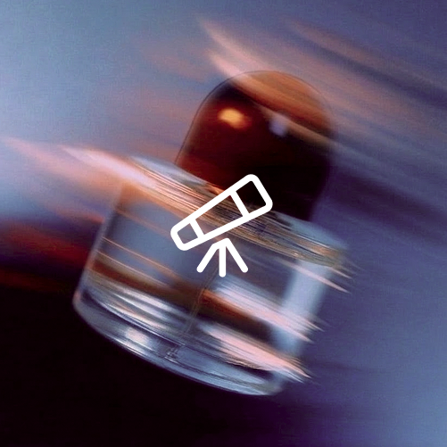 image of a perfume bottle in movement