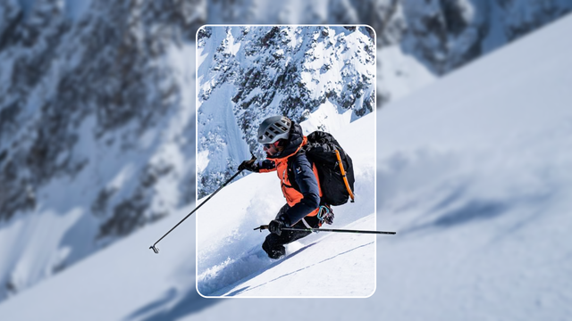 A downhill skier is framed in a white rounded rectangle.