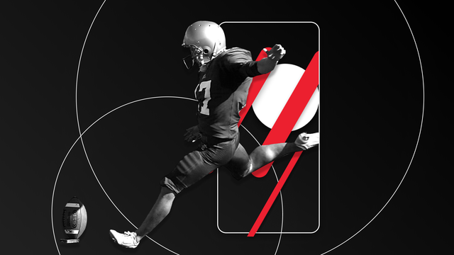 A football player about to kick the football. He emerges out of a phone mockup.