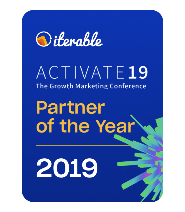 Badge with "Iterable, Activate19: The Growth Marketing Conference, Partner of the Year 2019" text, featuring a colorful geometric design.