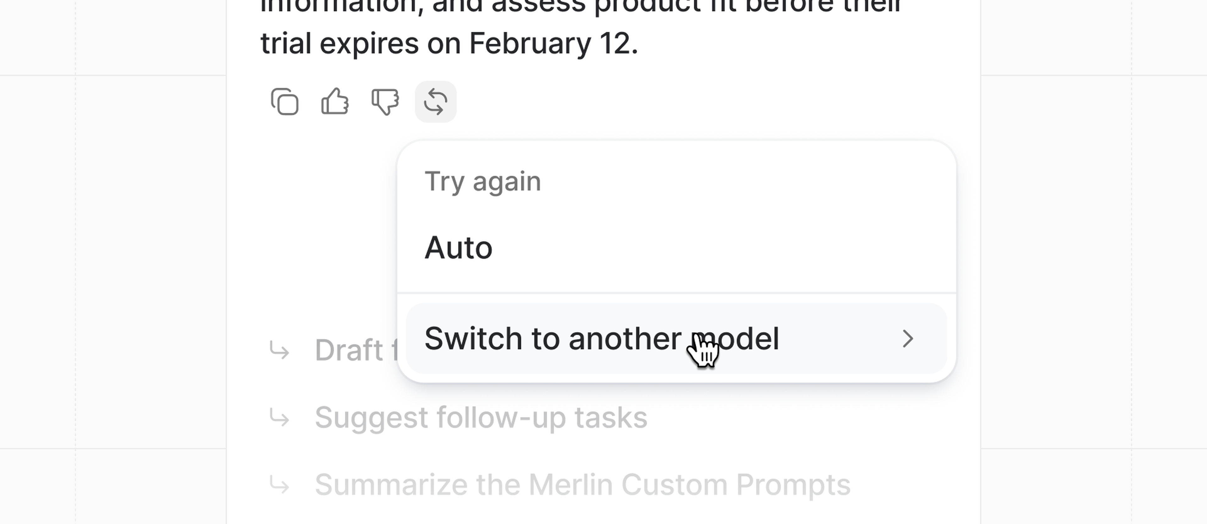 Dropdown menu with options “Auto” and “Switch to another model.” A cursor points to “Switch to another model” on a blurred background.