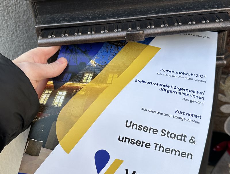 Stadtinfobroschüre in einem Briefkasten