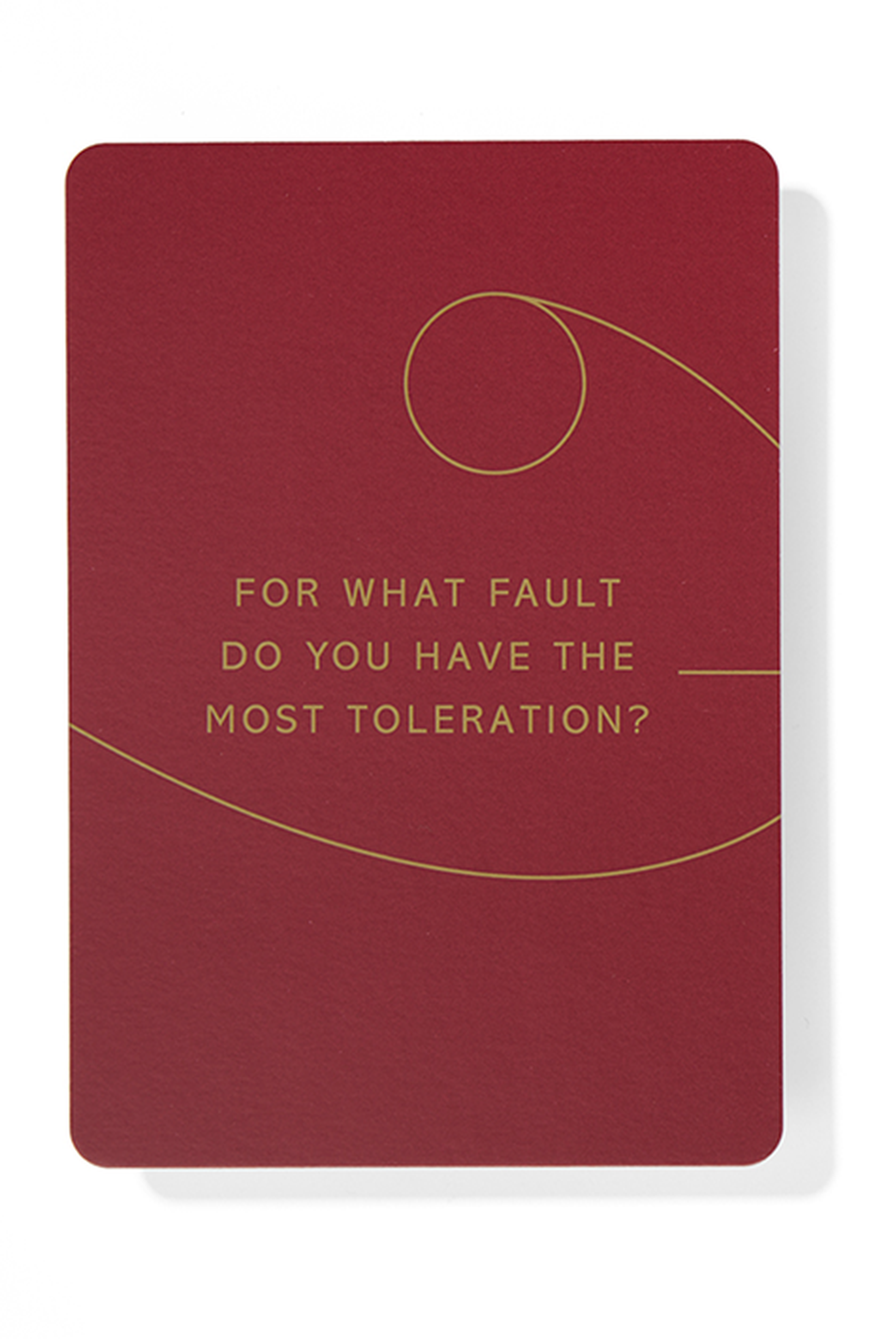 A red card with gold text asking, "For what fault do you have the most toleration?" and featuring a decorative gold swirl.