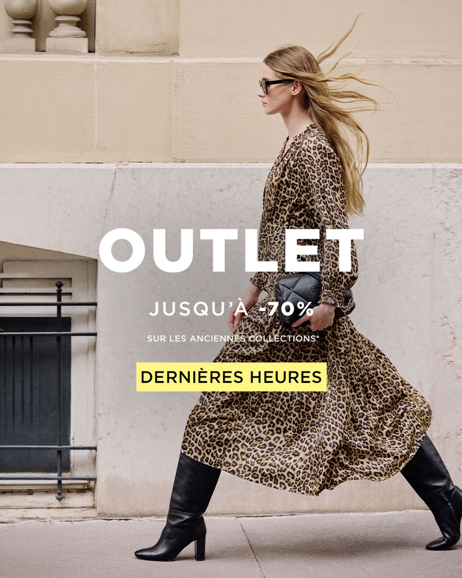 A woman in a leopard print dress and black boots walks briskly by a wall. Text overlay advertises an outlet sale with discounts up to 70%.