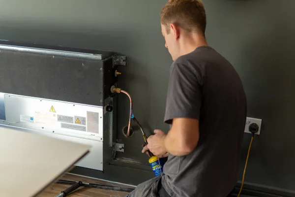 Air Conditioning Engineer With Blow Torch