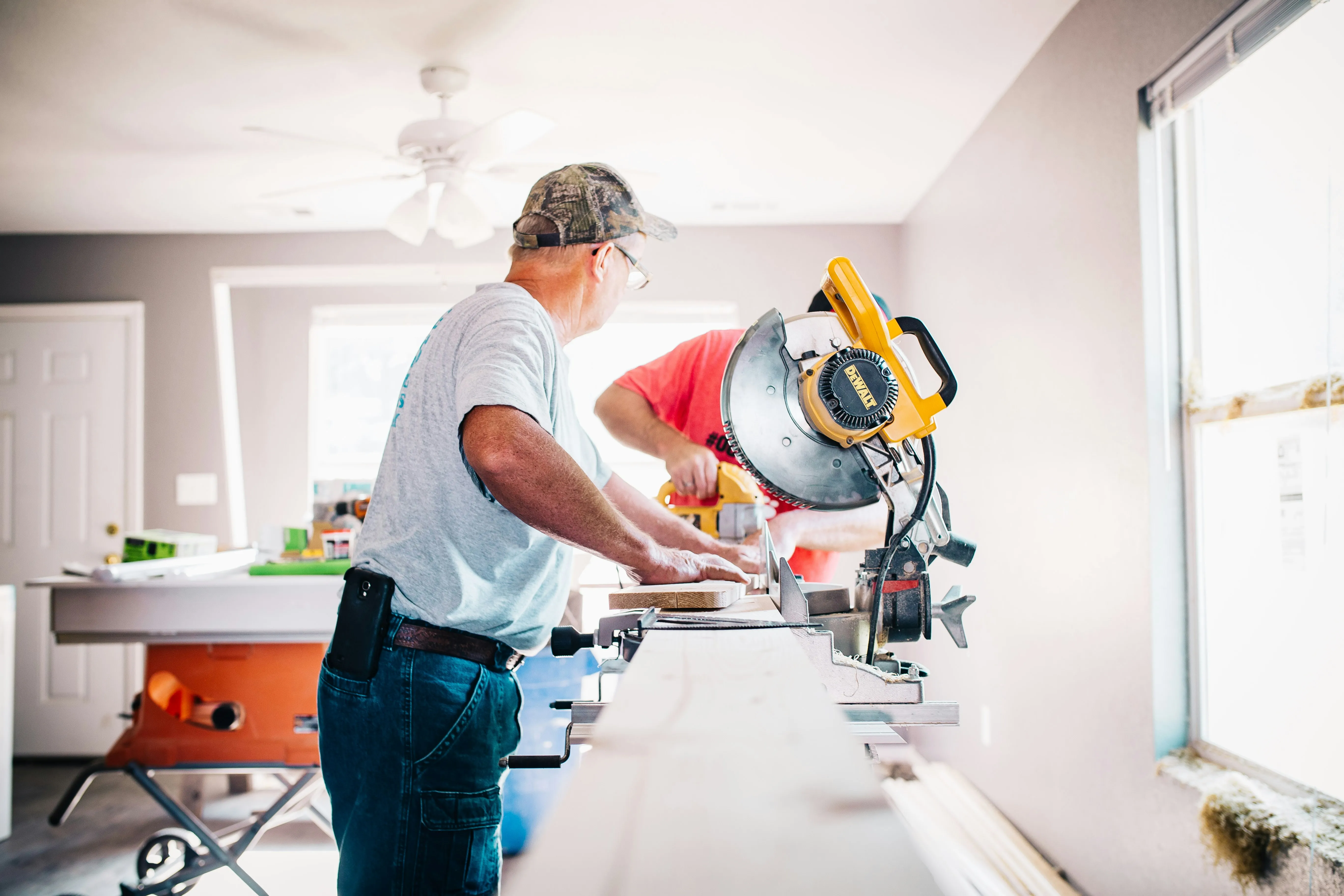 Carpenter Cutting Wood With Circle Saw
