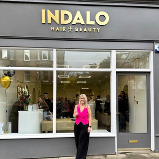 indalo business owner standing outside her shop front