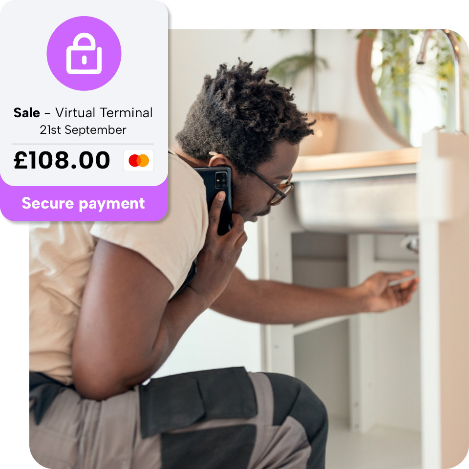 A person using a phone while checking under a sink. A payment notification for £108.00 is displayed, indicating a secure virtual terminal sale.