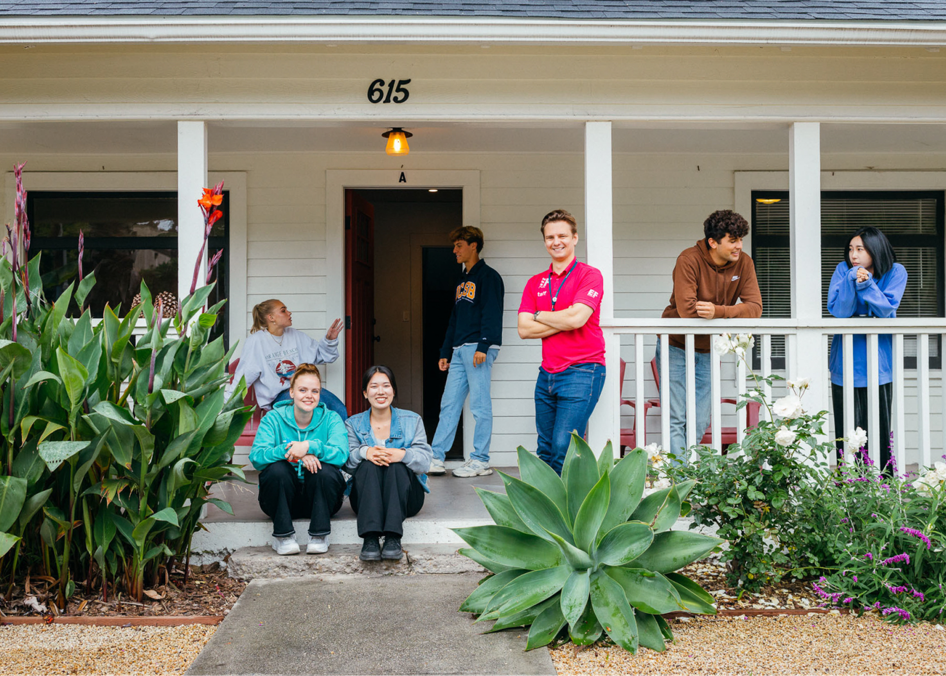 Students and staff at house