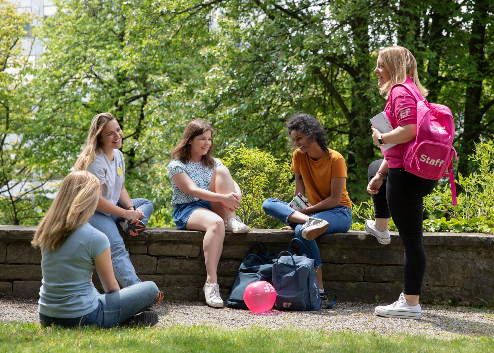 Students And Staff Talking