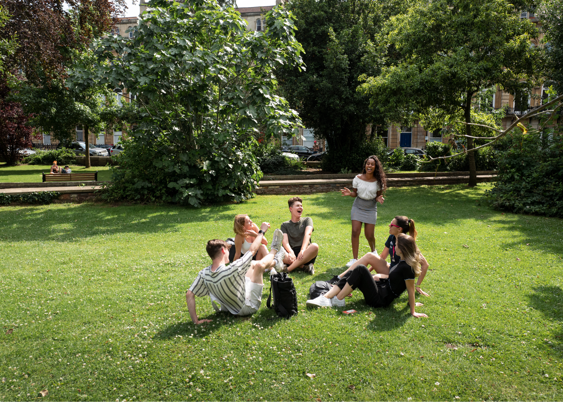 Students Enjoying In Lawn