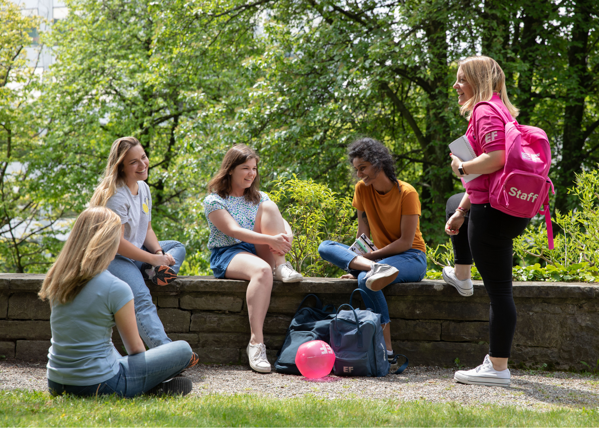 Students And Staff Talking