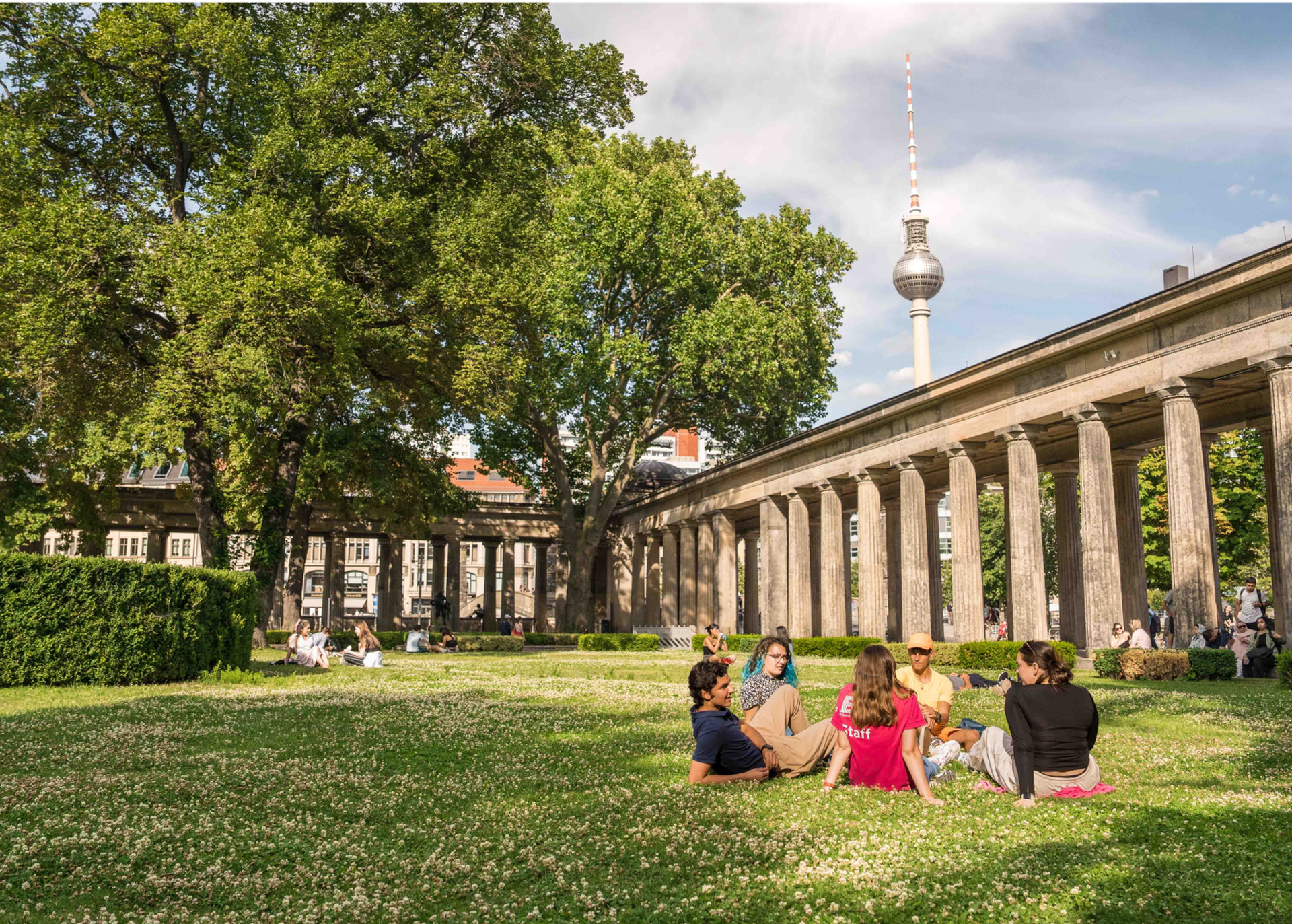 Students Sitting In Park