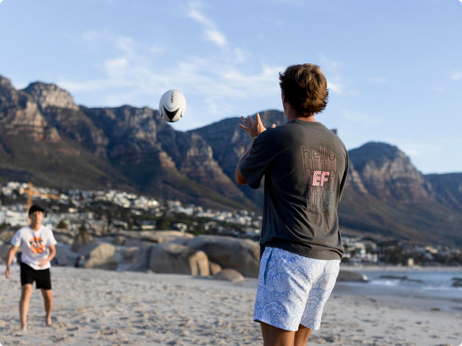 Playing Volleyball At Beach