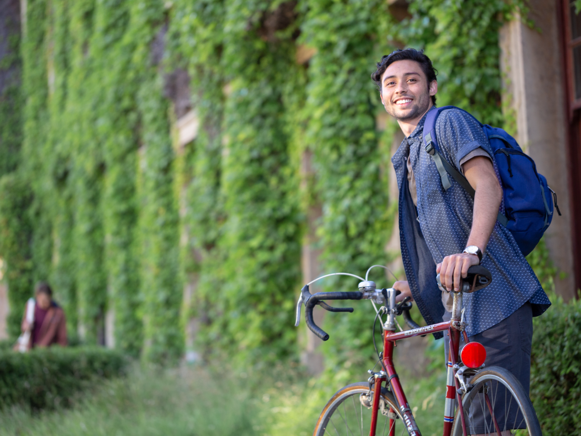 Student Holding Bicycle