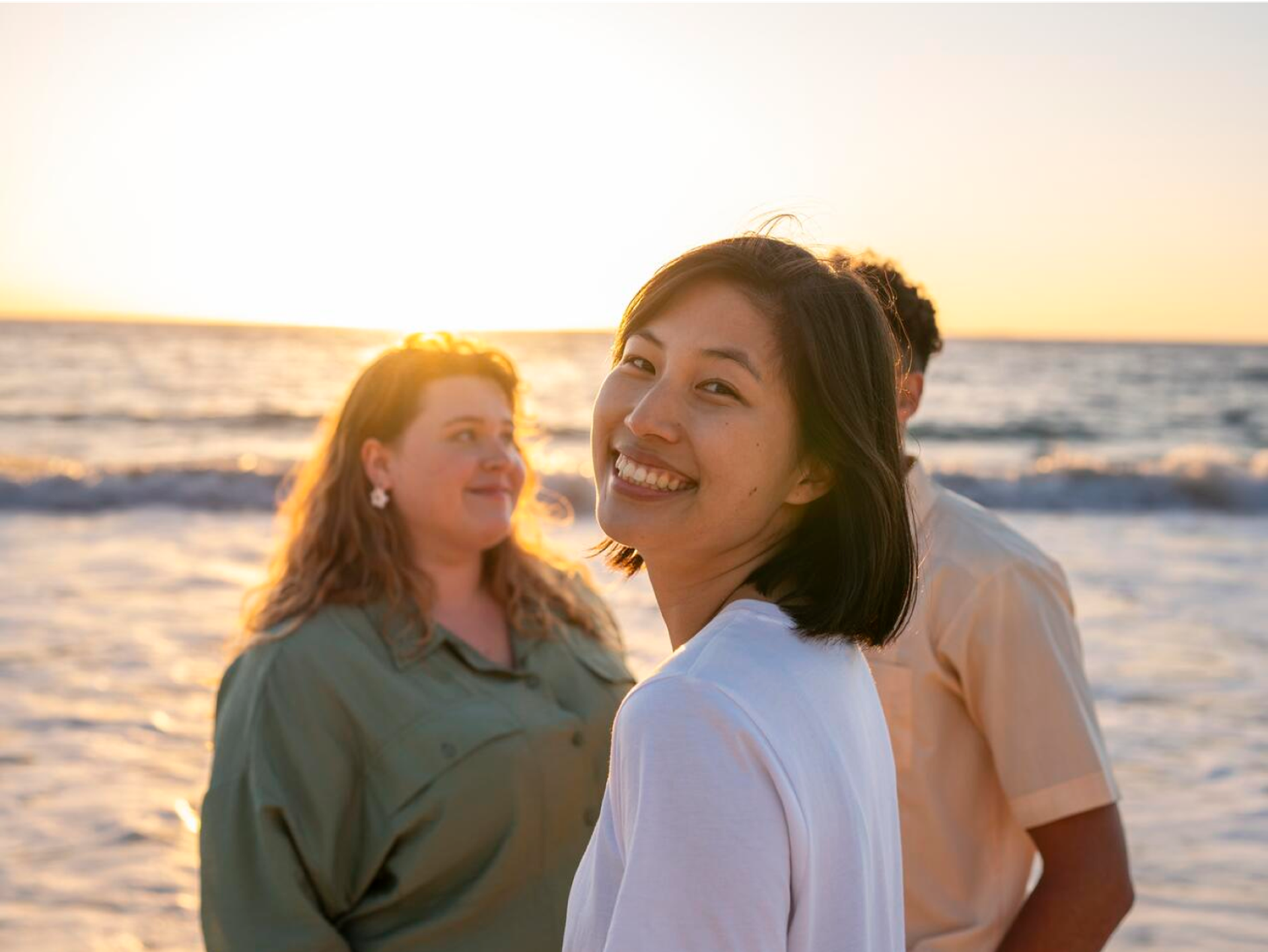 Students Smiling At Beach
