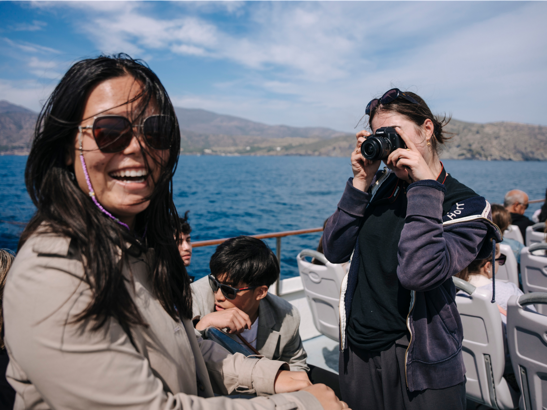 Students Clicking Picture on Boat