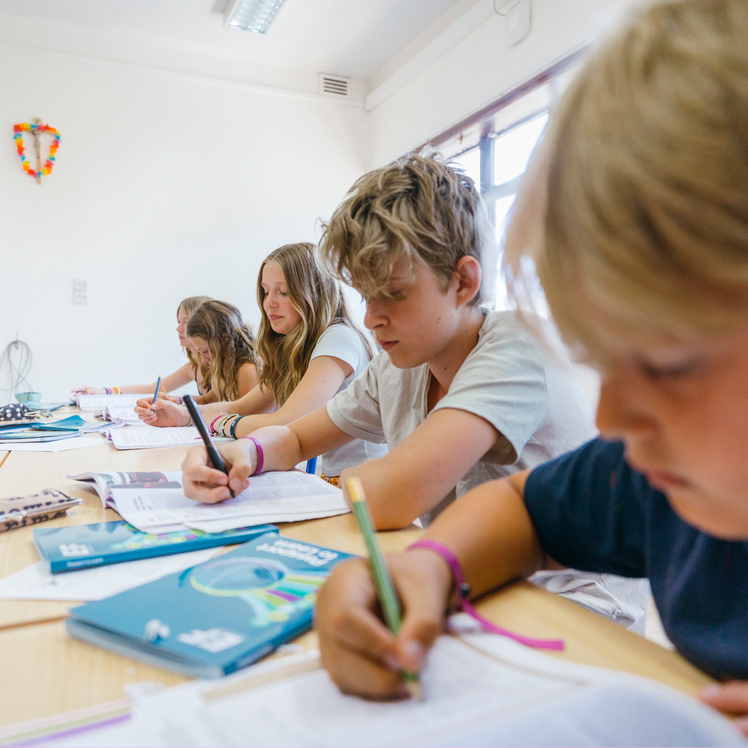04_GB_DEV_Gallery_Campus_StudentsWritingNotes