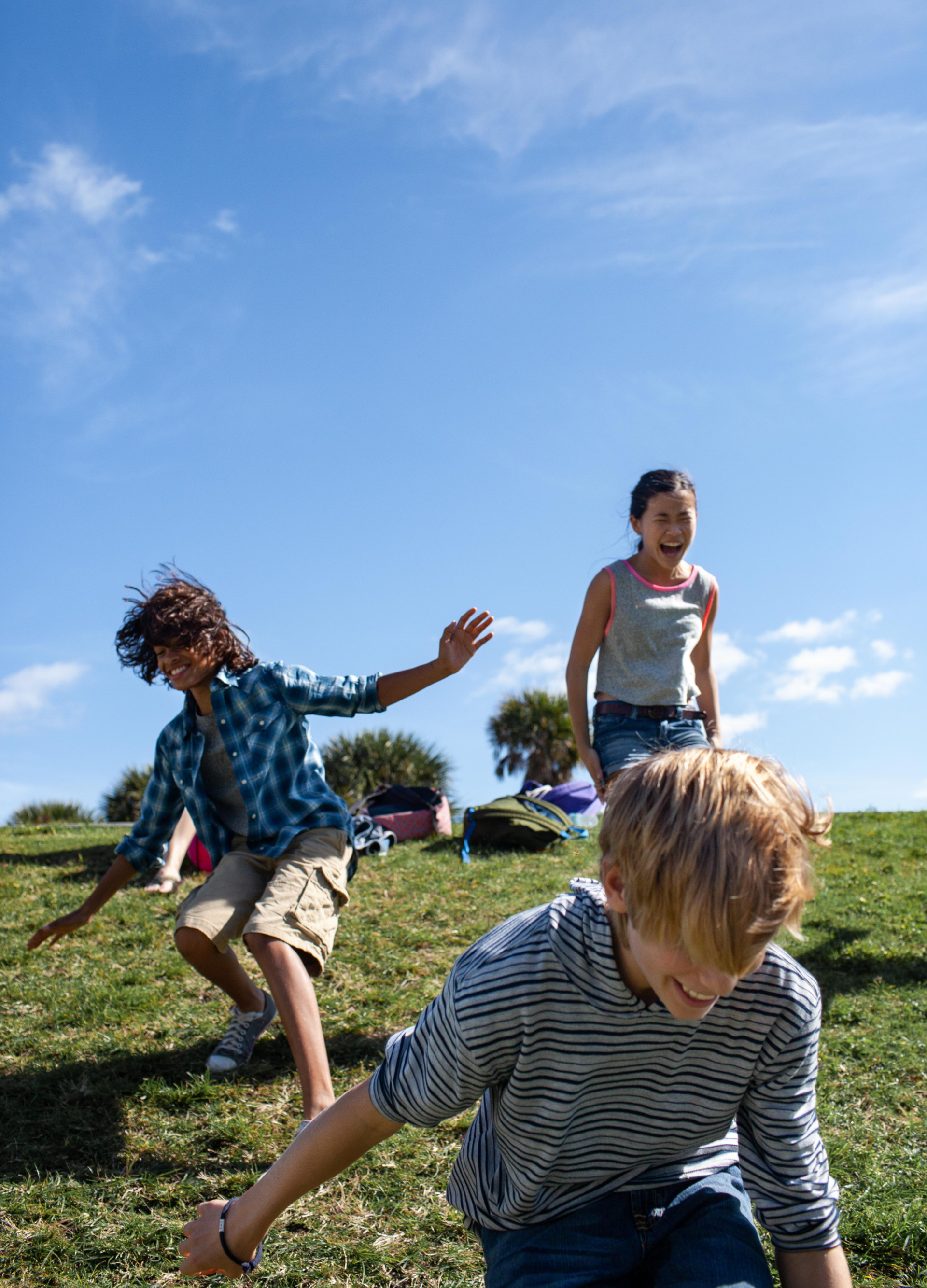 Students Playing In Lawn