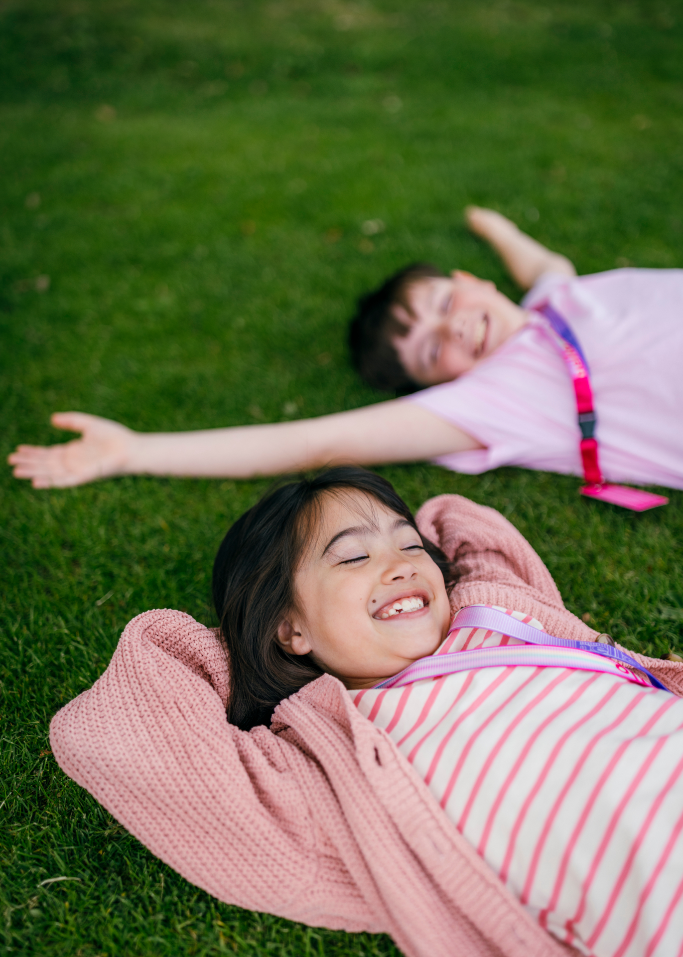 Students Lying Down In Lawn