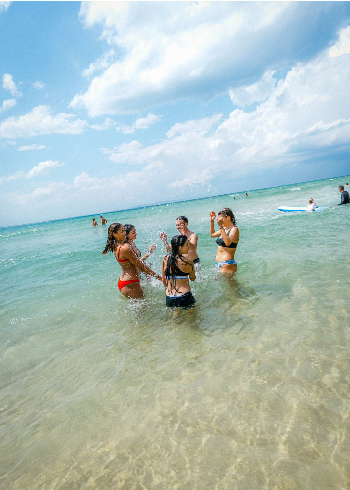 Students Playing In Beach