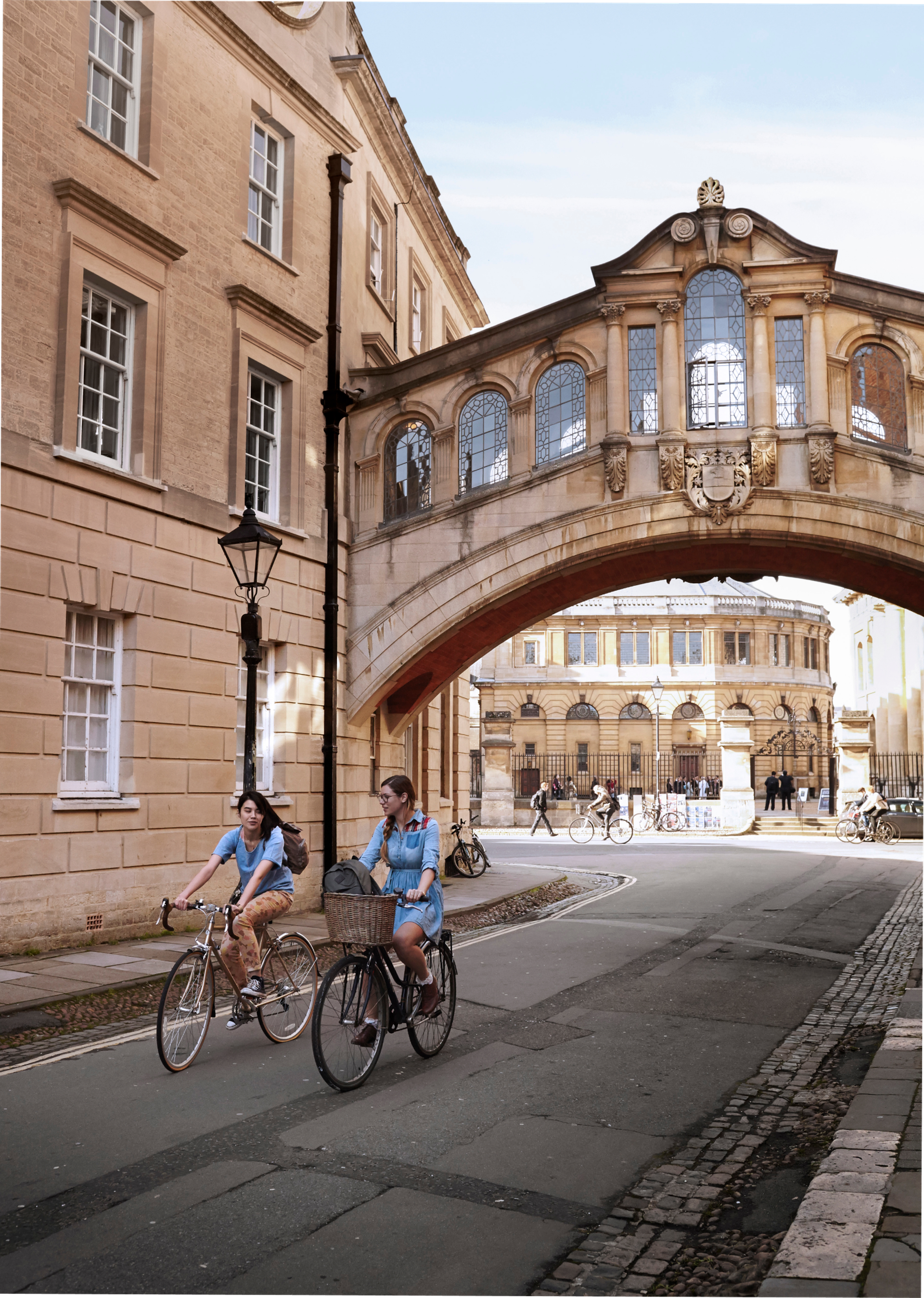 Students Cycling Near Bridge Of Sigh