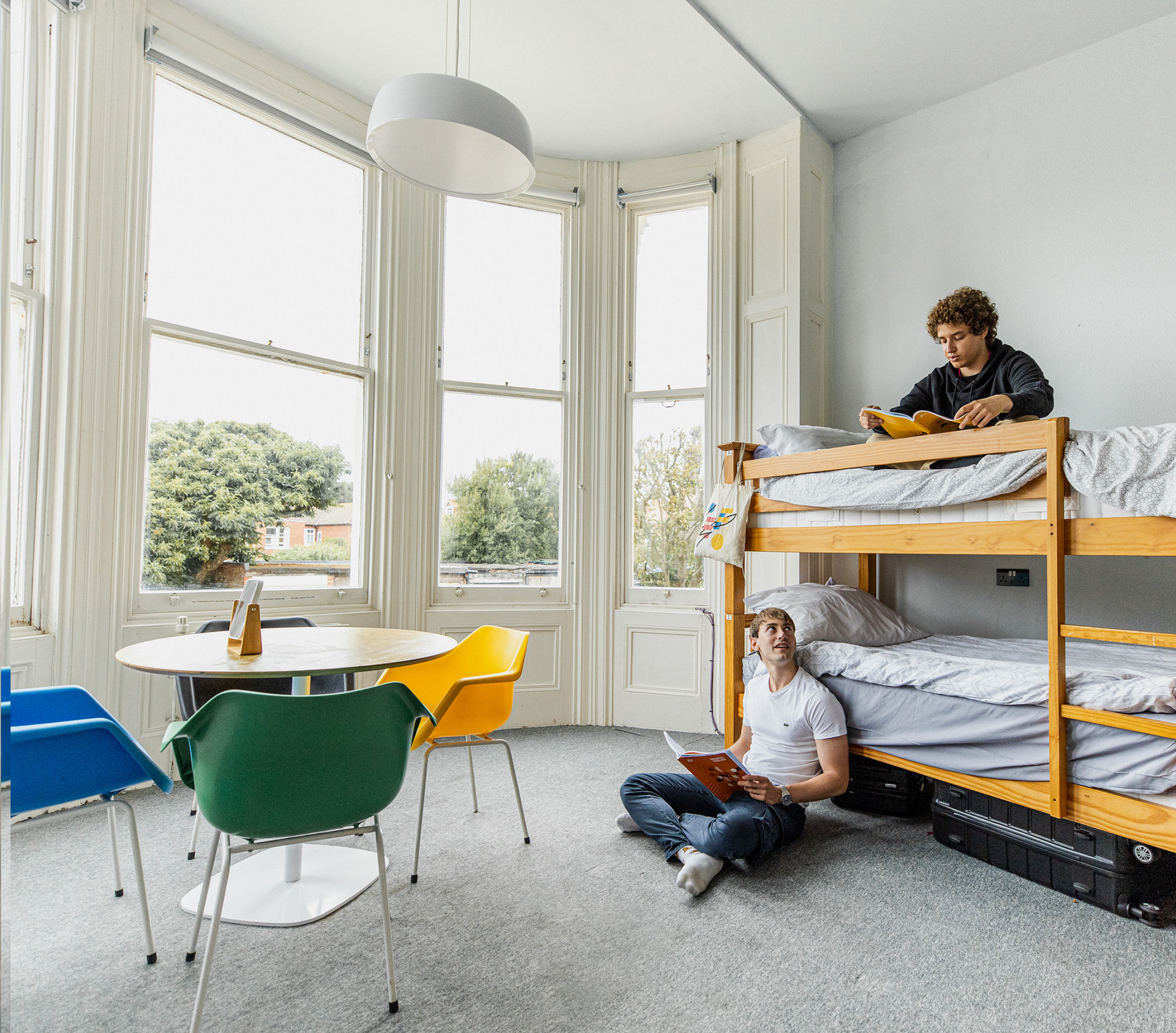 Students Reading In Dorm Room
