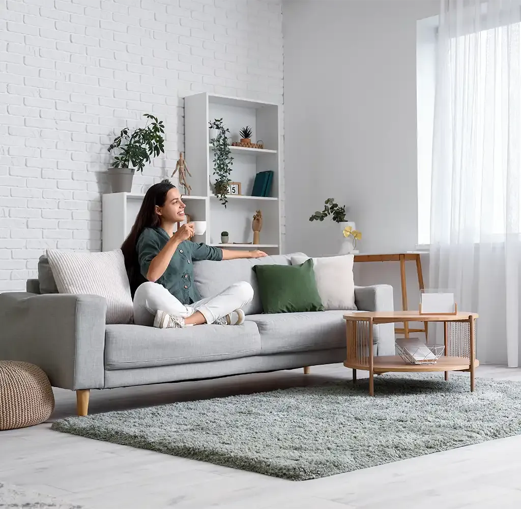 new homeowner relaxing in her new home stress-free