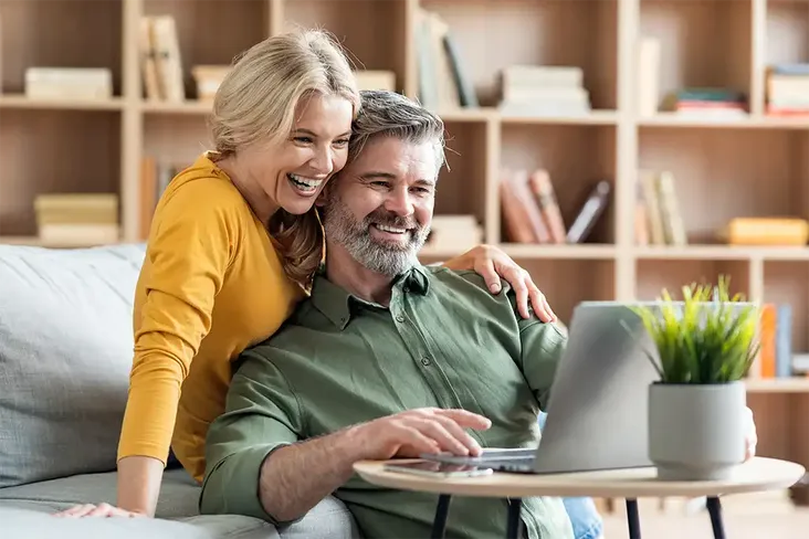 home owners in their kitchen wondering what to do next with their house