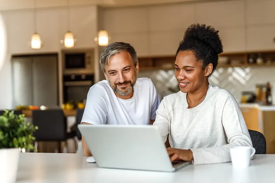 couple reading expert articles online