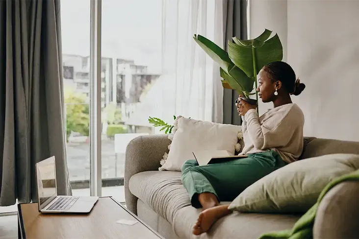 young homeowner reflecting on her decision to buy the freehold of her flat