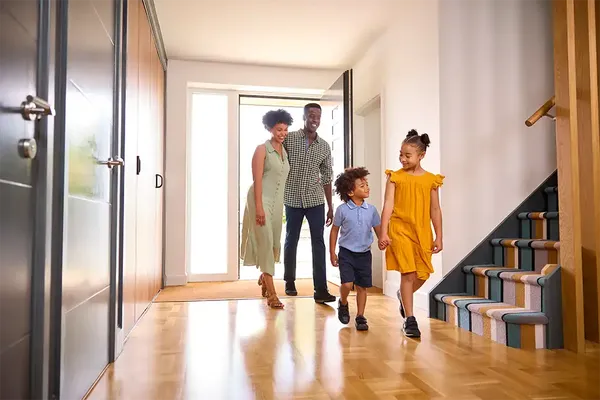 family looking around a house at a property viewing
