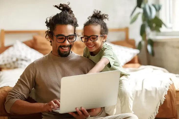man looking at his conveyancing fees online