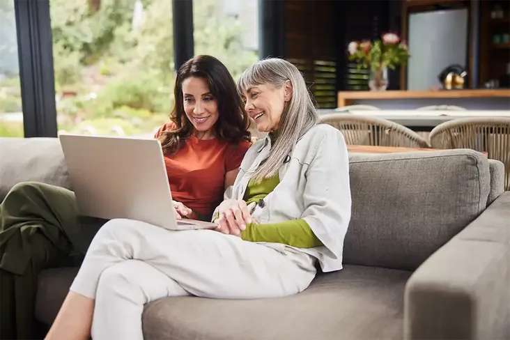 daughter showing her mum the house she is buying