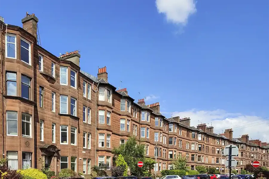 Old historical houses in a street of Glasgow Scotland England