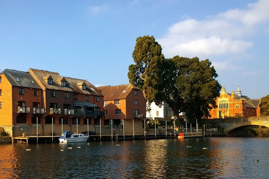 Houses backing onto the River Avon Evesham Worcestershire West Midlands England UK