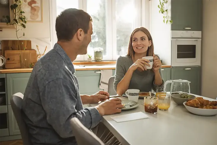 homeowners talking about how to make their home more energy efficient