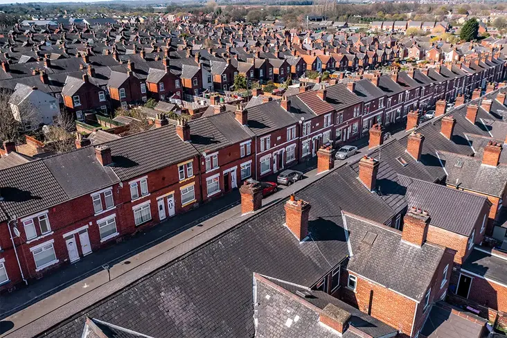aerial view of a house for auction on a large estate