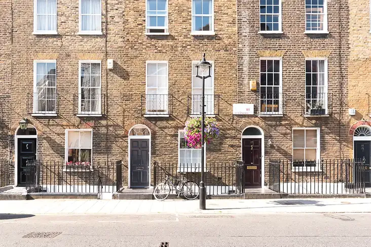 row of terraced houses in London popular with investors looking to buy to let