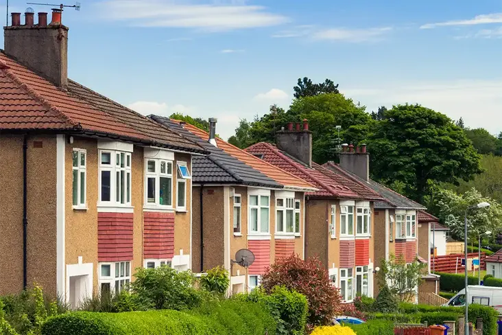 house in a row of terraced houses for sale via an auction
