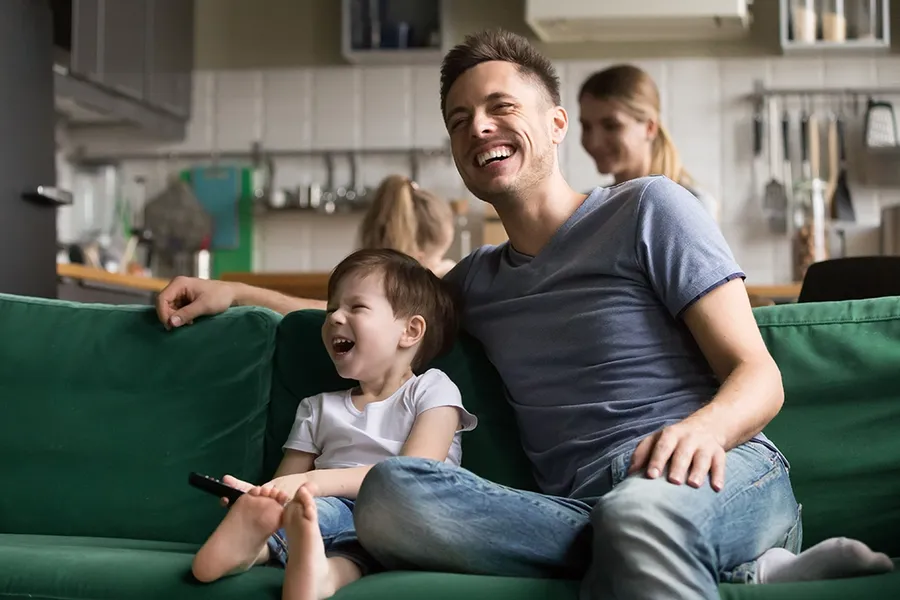 family watching tv at home