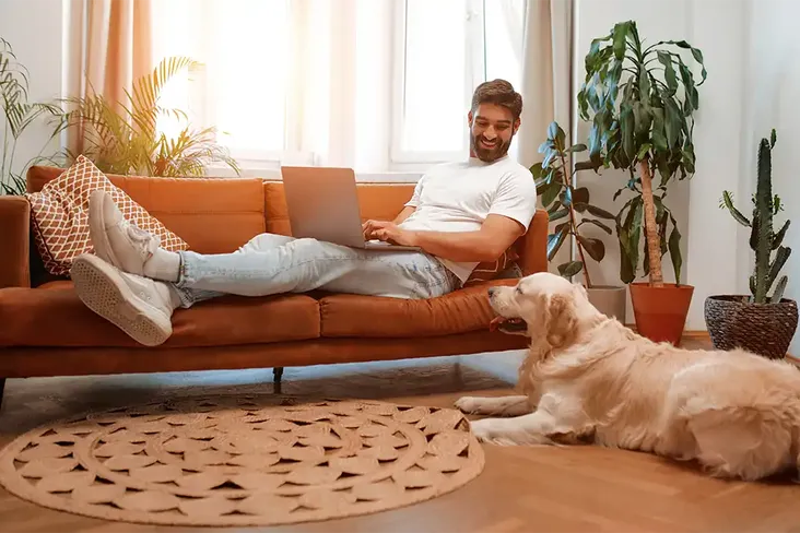 a man looking at the process to get a mortgage so he can buy his first home