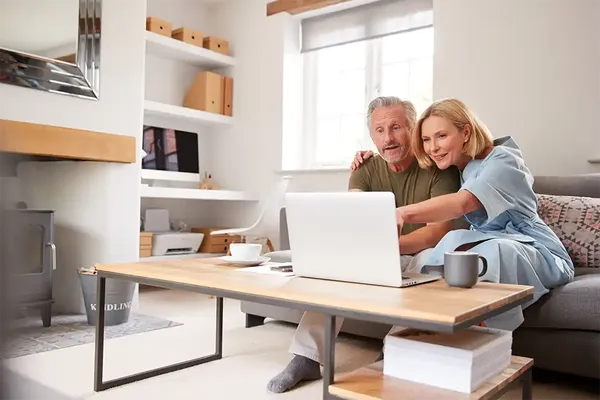 mature couple looking at their remortgage options