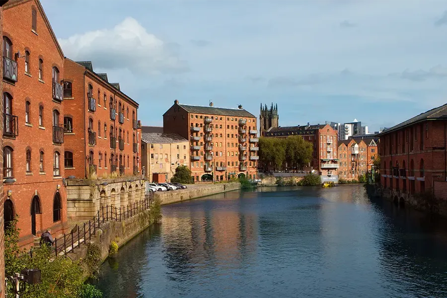 modern flats along the River Aire in Leeds, Yorkshire, UK