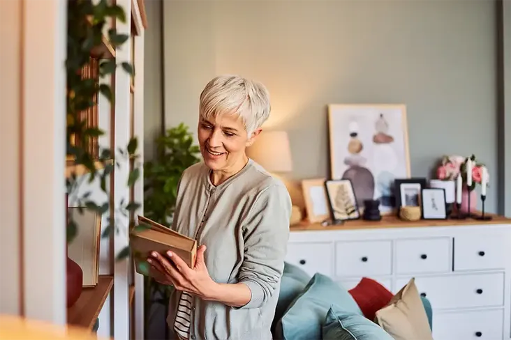 homeowner looking at a guide to conveyancing getting ready to sell their house