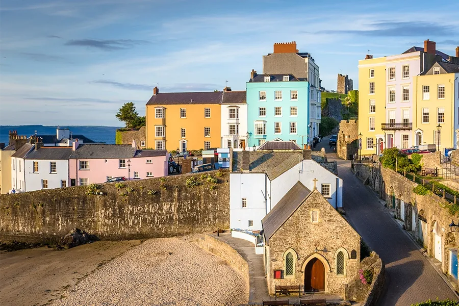colourful town houses alongside the Harbour in Tenby, Wales, UK