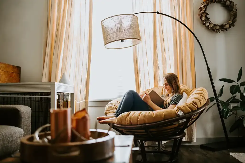homeowner relaxing in her new home