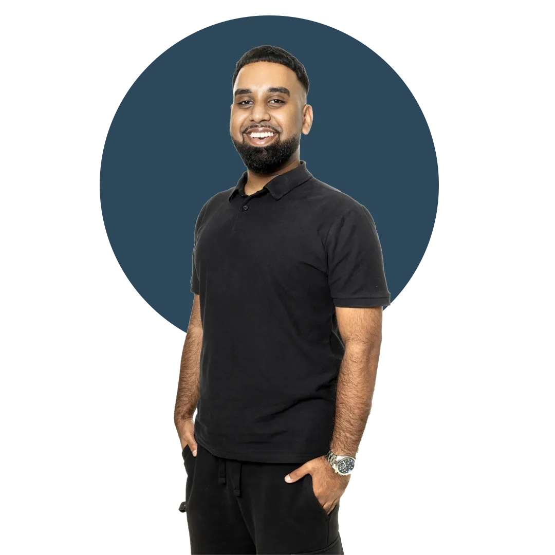Umar Mansoor smiling in a black polo shirt and trousers stands confidently against a large, dark blue circular background.